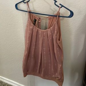 Small, mauve, adjustable tank top